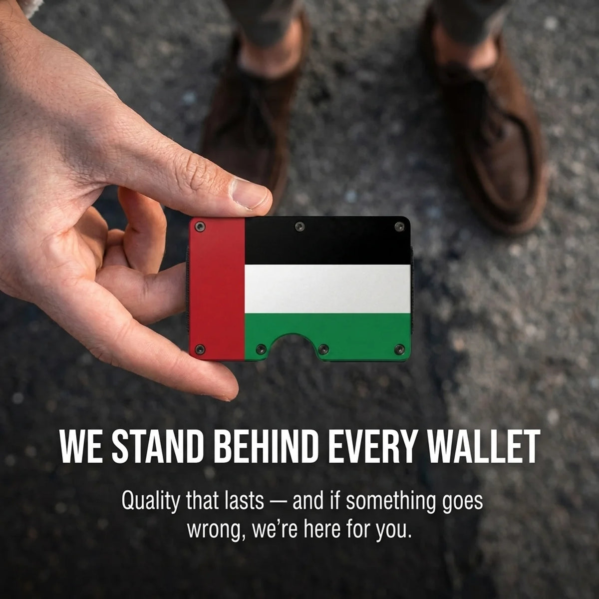 Zade UAE flag edition wallet held up showing lifetime warranty guarantee
